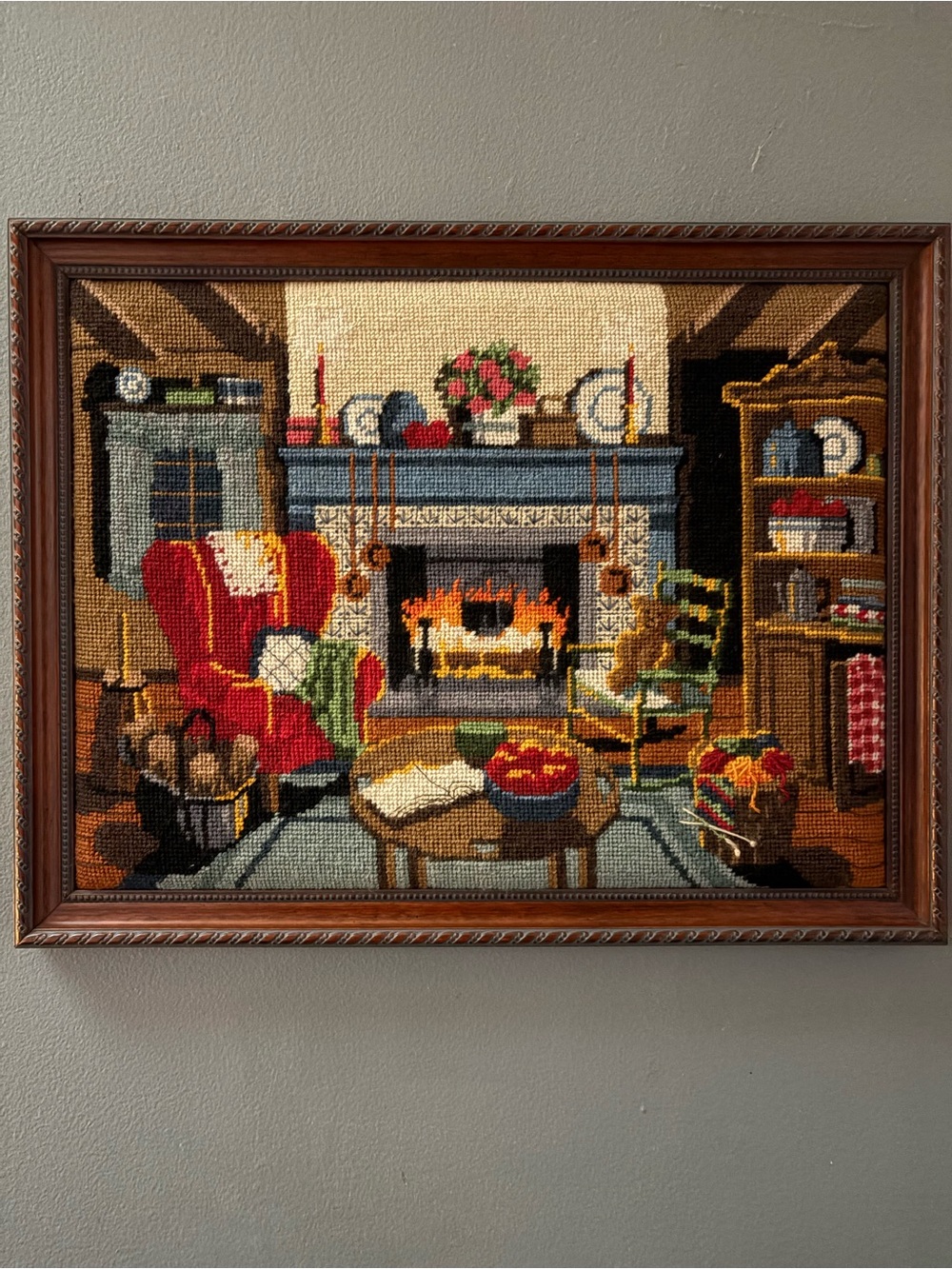 1983 vintage Framed Needlepoint Hearth Scene Wall Art in Red, Green and Brown